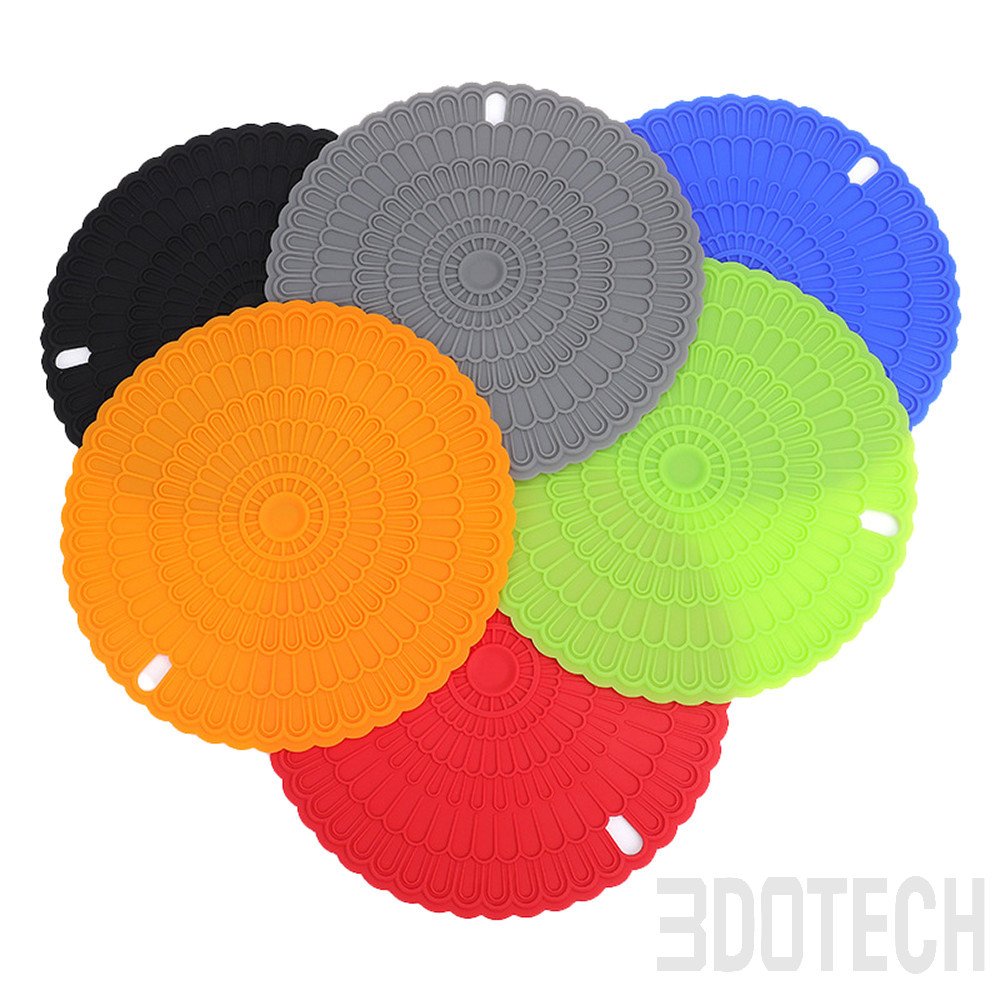 Colorful round silicone trivets with hole